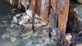 Damaged culvert pipe and landslip